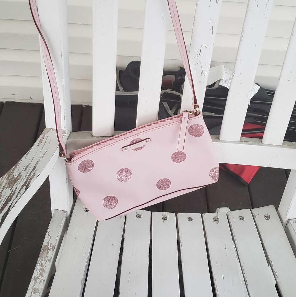 Kate Spade small pink polkadot crossbody bag.